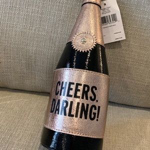 Cheers, Darling! Kate Spade champagne bottle purse
